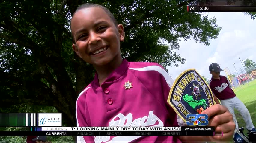 Kid brings smiles to law enforcement_01494711-159532