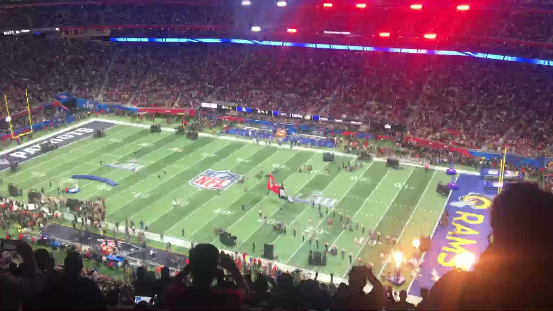 At the Super Bowl, eyes on iPhones not the field