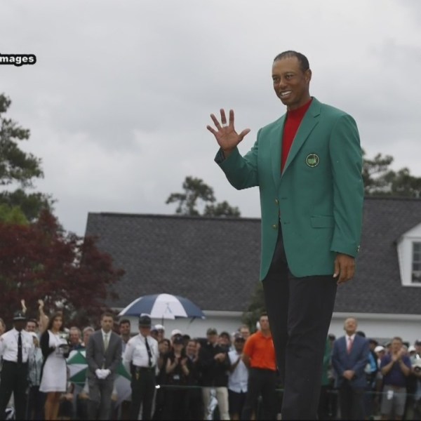 Chasing after the green jacket.