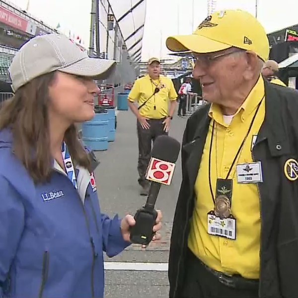 90-year-old yellow shirt working 50th Indy 500 at IMS