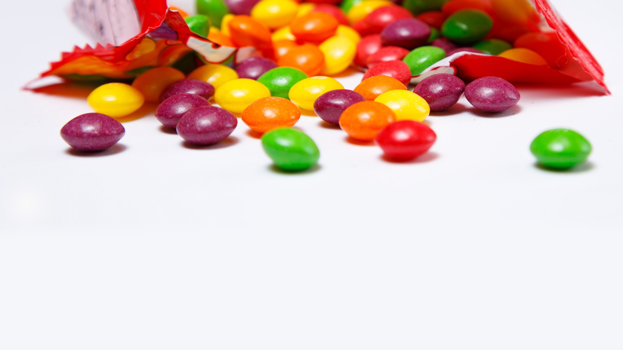 Openned pack with skittles in it_1560461968751