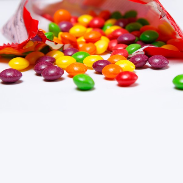 Openned pack with skittles in it_1560461968751